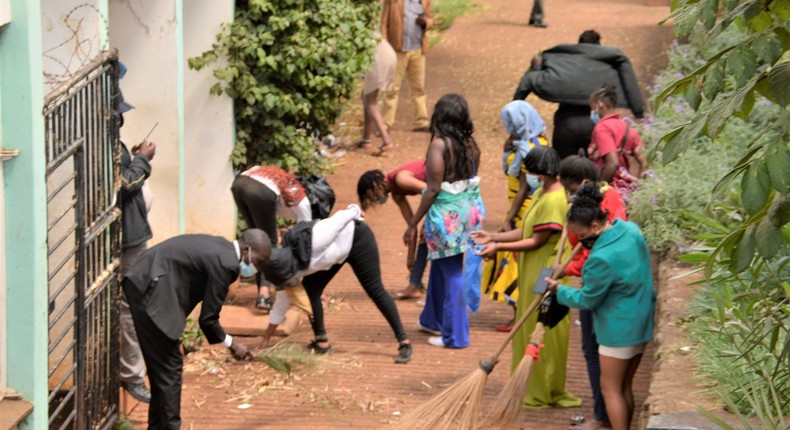 Some of the 57 Kenyans cleaning the streets as punishment for flouting Covid-19 rules