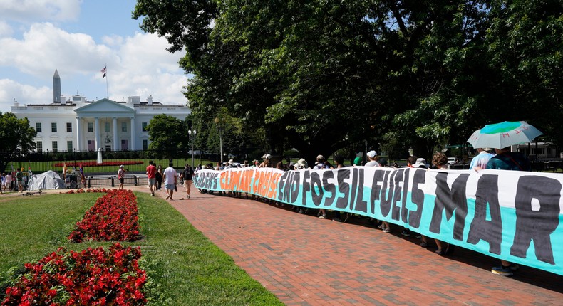 Climate activists rally in front of the White House in 2023.Yuri Gripas/AP.