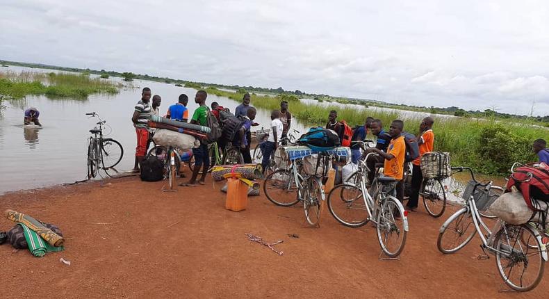 Floods: BECE candidates in Northern region transported by canoe to exams centre 