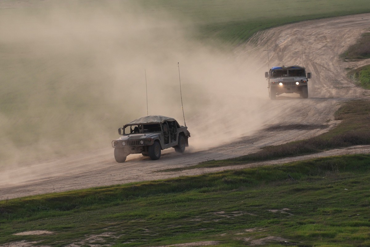 Israeli soldiers patrol along the southern part of the Gaza Strip