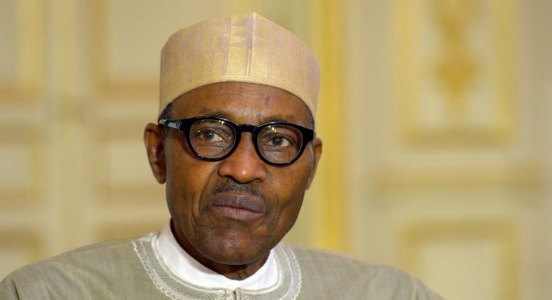 Nigerian President Muhammadu Buhari speaks to the press in Paris in September 2015