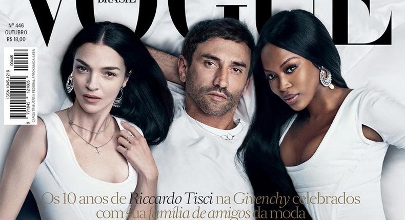 Givenchy's creative director Riccardo Tisci is pictured in bed with muses Naomi Campbell and Mariacarla Boscono for Vogue Brazil's latest issue.