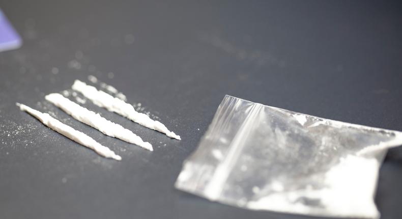 A stock photo shows a bag of cocaine with lines of the drug.Getty Images