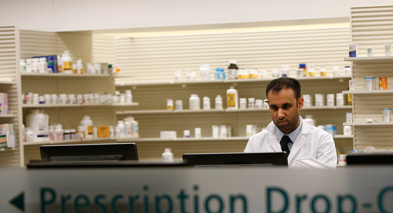 Safeway pharmacist Ronak Amin is shown at is work station at the store in Wheaton, Maryland February 13, 2015.