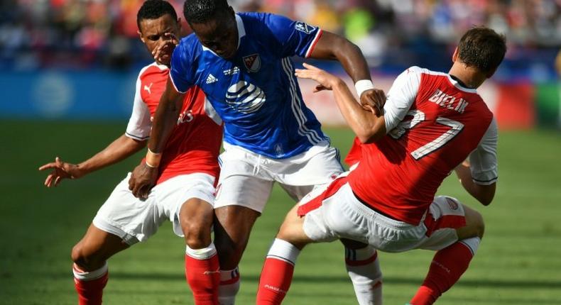 Montreal Impact's Didier Drogba (C) fights for the ball with Arsenal's Krystian Bielik during an MLS All-Star match at Avaya Stadium in San Jose, California, in July 2016