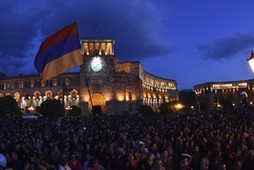 People celebrate after Armenian PM Sarksyan resigned following almost two weeks of mass street protests, in central Yerevan