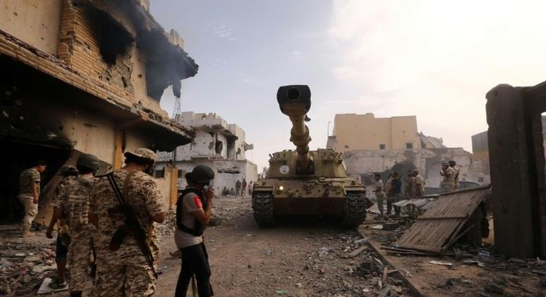 Soldiers loyal to Libya's UN-backed government in Sirte, east of Tripoli on October 14, 2016, during their military operation to clear Islamic State group jihadists from the city