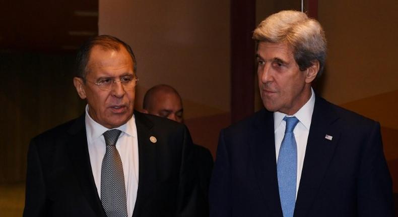 Russian Foreign Minister Sergey Lavrov (L) and US Secretary of State John Kerry, seen in November 2016, met in Germany December 7, 2016