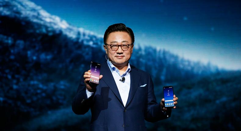 DJ Koh, Samsung president of mobile communications, shows the Galaxy S8 and S8+ smartphones during the Samsung Unpacked event in New York City, United States March 29, 2017.