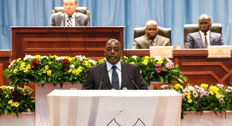 Congolese President Joseph Kabila (C) speaks during a special joint session of parliament on November 15, 2016 in Kinshasa