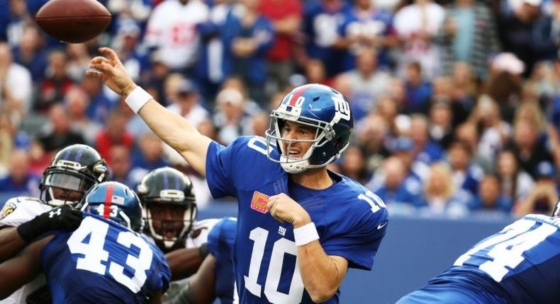Giants' quaterback Eli Manning is one of his team's few remaining players who defeated the Dolphins at Wembley in the first NFL regular-season game played in the UK