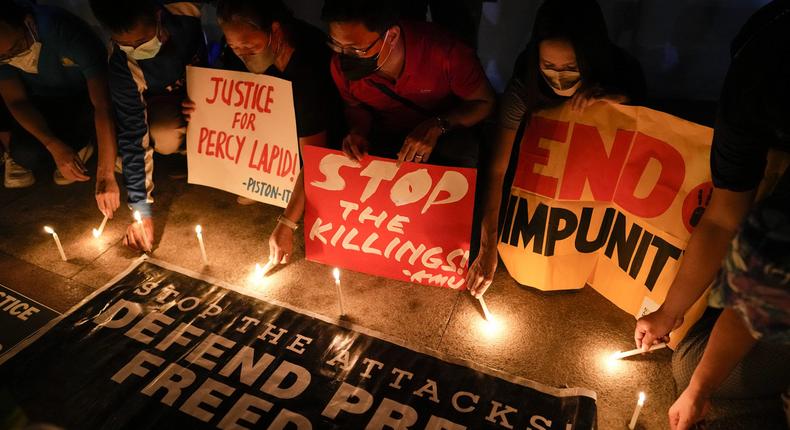 Manifestation à Quezon City, aux Philippines, après le meurtre du journaliste Percival Mabasa, le 4 octobre 2022. — © Aaron Favila/AP Photo/Keystone