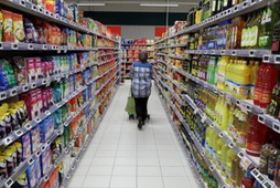 FILE PHOTO: A customer shops in a Casino supermarket in Nice