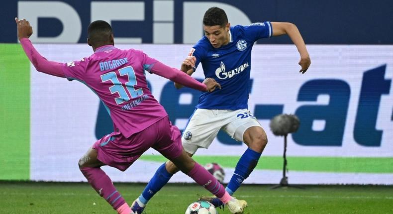 Moroccan international Amine Harit (R) of Schalke contests possession against Hoffenheim in the Bundesliga at the weekend.