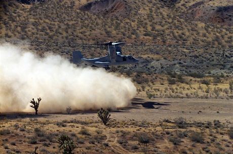 Las Vegas, Nev. (Sept. 30, 2004) Đ A U.S. Marine Corps V-22 Osprey assigned to Marine Tilt-rotor Test and Evaluation Squadron Two Two (VMX-22), hovers near Nellis Air Force Base, Nev. VMX-22 is currently assessing the OspreyŐs performance in austere environments. The squadron is also conducting pilot and aircrew proficiency training for their Operation Evaluation, which begins in January. U.S. Marine Corps photo by Chief Warrant Office Brook R. Kelsey (RELEASED)