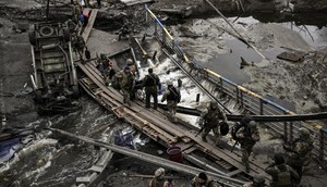 Ukraine blew a dam and bridges across the Irpin River to hinder Russia's advance in the war's earliest days.ARIS MESSINIS/AFP via Getty Images