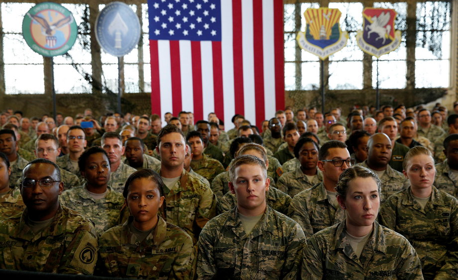 Military personnel listen to U.S. President Barack Obama speak about counter-terrorism during his visit to MacDill Air Force Base, home to U.S. Central Command and U.S. Special Operations Command, in Tampa, Florida, U.S. December 6, 2016