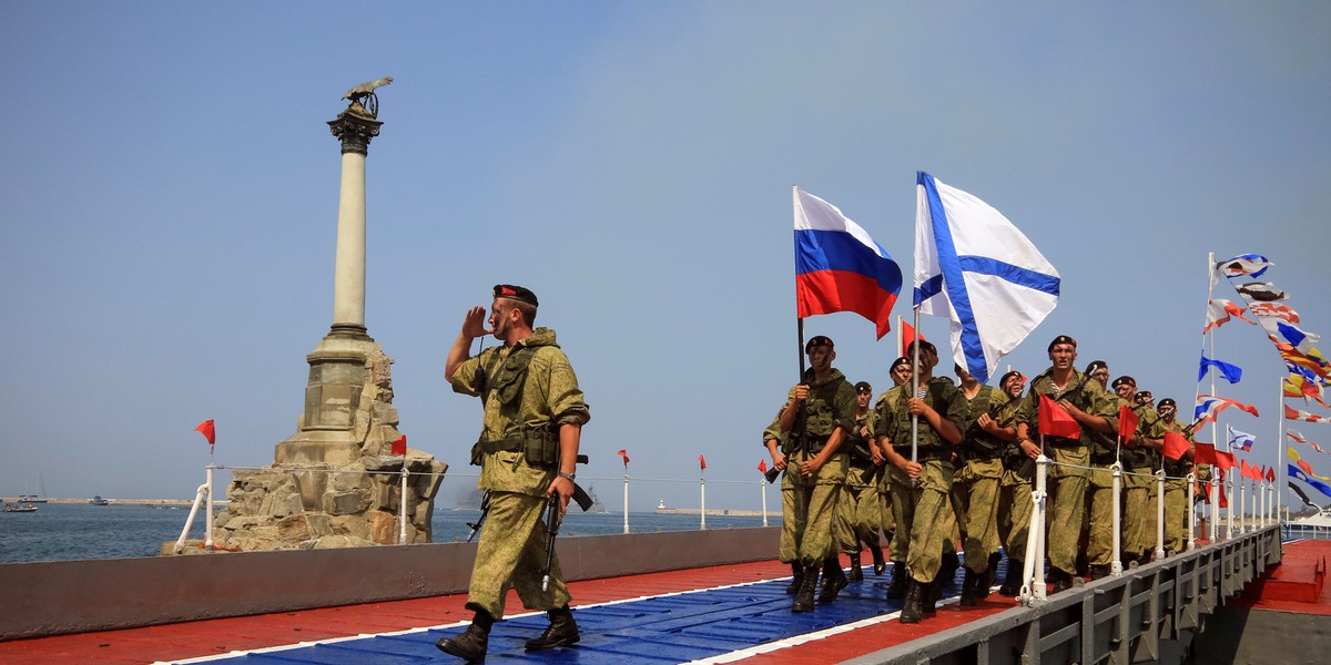 Russian marines parade during the Navy Day celebrations in Sevastopol, Crimea, July 31, 2016.