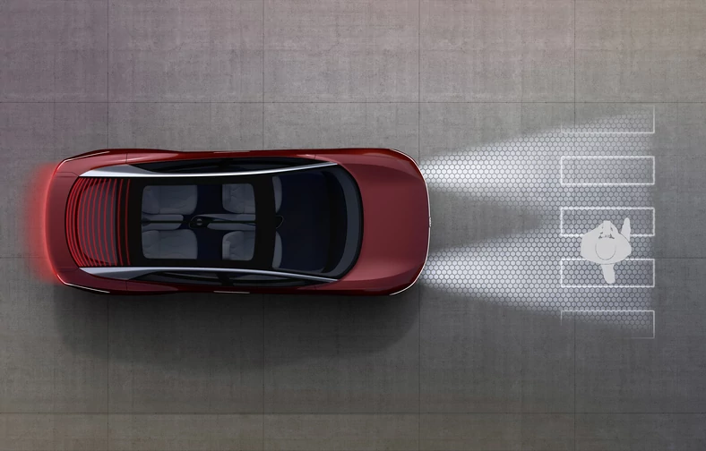 Volkswagen I.D. Vizzion będzie rozpoznawać pieszych i w razie potrzeby ułatwiać przejście przez jezdnię dzięki projekcji odpowiednich grafik na nawierzchnię