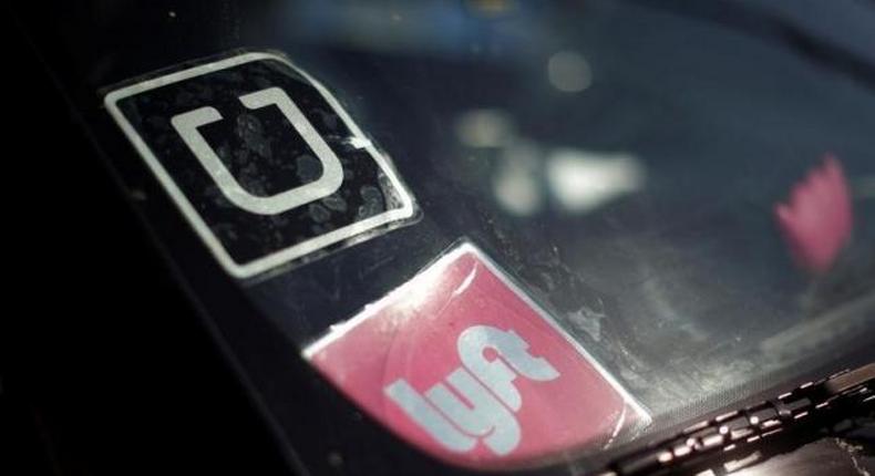 Uber, Lyft settle litigation involving top executives