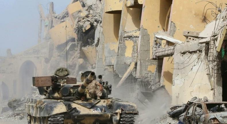 Forces loyal to Libya's UN-backed Government of National Accord are seen in Sirte, east of the capital Tripoli, during an operation to clear Islamic State group jihadists from the city, on October 14, 2016