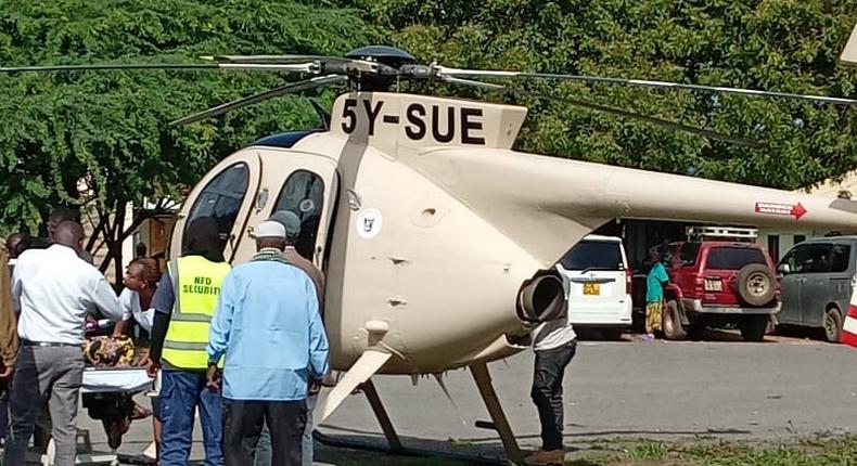 NRT Kenya's chopper, a Hughes 369FF (530MG), evacuating a woman in Isiolo county