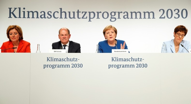 (l to r) Rhineland-Palatinate's State Premier Malu Dreyer, German Finance Minister Olaf Scholz, German Chancellor Angela Merkel and German Defence Minister Annegret Kramp-Karrenbauer announce the 2030 Climate Prtoection Programme on Friday