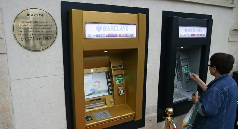 A bank in London marked the ATM's first half-century by giving a gold makeover and a roped-off red carpet to the site where the very first cash machine was installed