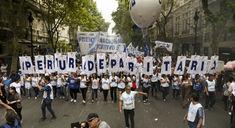 Teachers march during a 48-hour nationwide strike demanding pay rises, in Buenos Aires on March 22, 2017