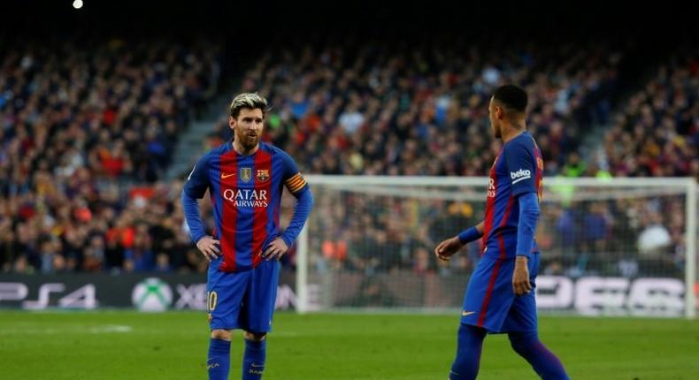 Barcelona's Argentinian forward Lionel Messi (L) may clash with team mate Brazilian forward Neymar at a Superclassico gala match in Australia next year