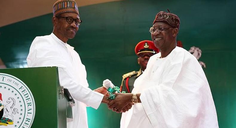 President Muhammadu Buhari with Minister of Information and Culture, Lai Muhammed