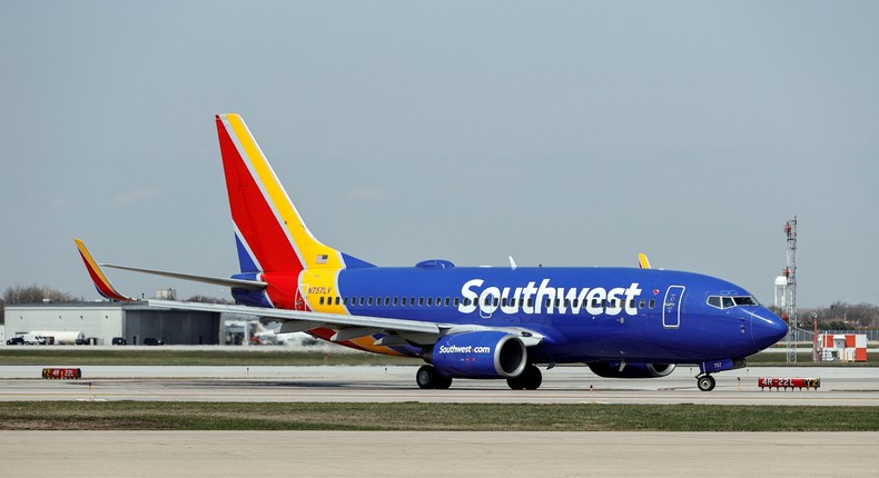 A Southwest Airlines Boeing 737-7H4 jet taxis to the gate.