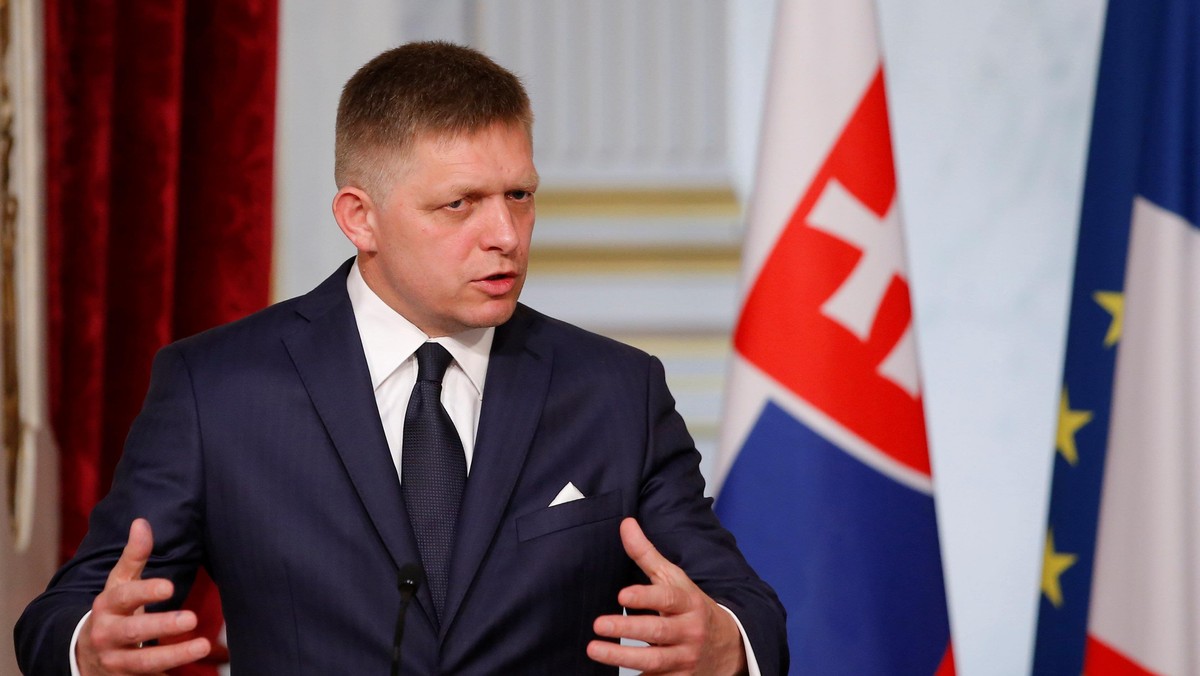 Slovakian Prime Minister Robert Fico gestures as he attends a joint news conference with the French President at the Elysee Palace in Paris