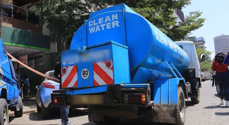 A water bowser delivers water in the city centre