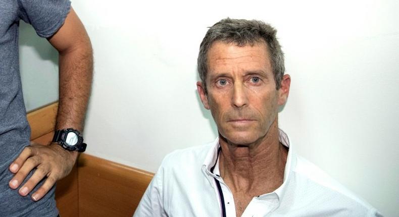 Israeli diamond magnate Beny Steinmetz arrives at a court in Rishon Lezion near Tel Aviv on August 14, 2017