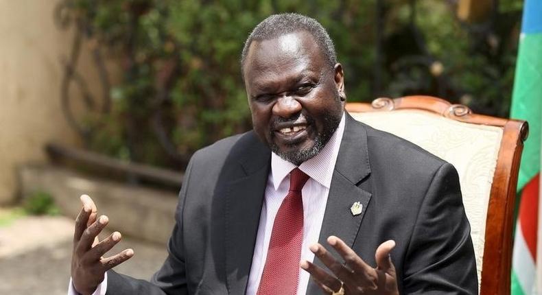 South Sudan's rebel leader Riek Machar addresses a news conference in his office in Ethiopia's capital Addis Ababa, August 31, 2015. REUTERS/Tiksa Negeri