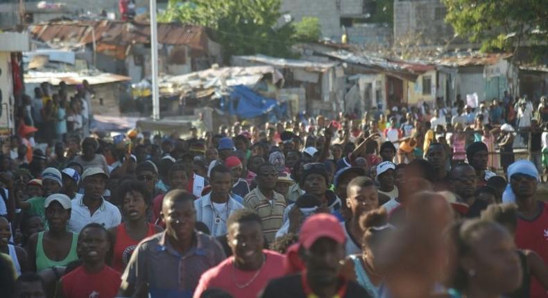 Supporters of losing presidential candidate Maryse Narcisse march in the Haitian capital Port-au-Prince to protest the election of Jovenel Moise as president