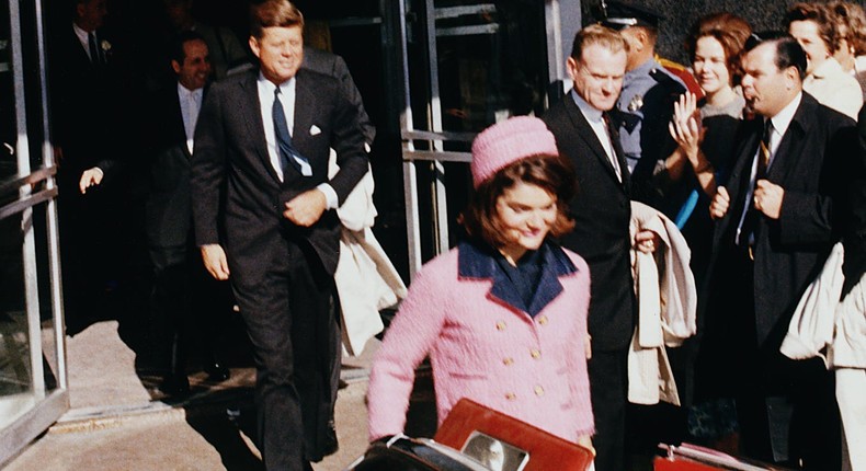 John F. Kennedy and Jacqueline Kennedy emerge from a Fort Worth, Texas, theater, into a waiting car on the day of Kennedy's assassination.CORBIS/Corbis/Getty Images