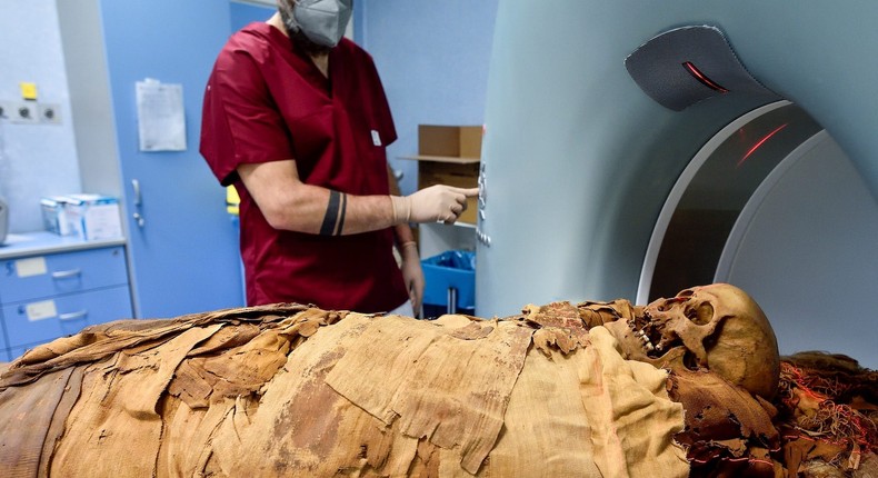 A medical radiology technician prepares a CT scan of mummified remains.REUTERS/Flavio Lo Scalzo