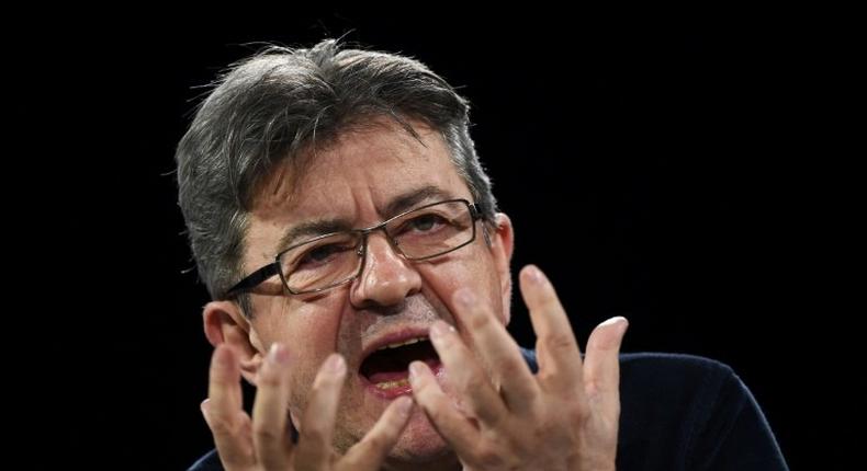 French presidential election candidate for the far-left coalition La France insoumise Jean-Luc Melenchon gestures as he delivers a speech during a campaign rally on April 2, 2017, in Deols, central France