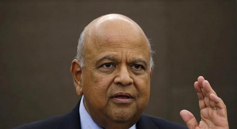 South African Finance Minister Pravin Gordhan reacts during a media briefing in Sandton near Johannesburg March 14, 2016. Picture taken March 14, 2016. 