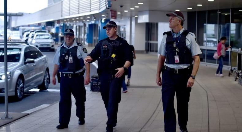 Security at major Australian airports has been strengthened after four men were arrested in Sydney on Saturday and accused of planning an attack