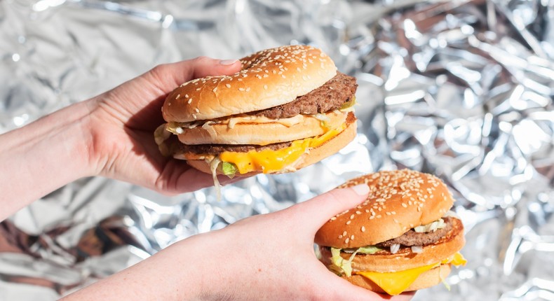 The burger's massive size can really be seen when placed next to its progenitor. It's ... enormous. Gargantuan.