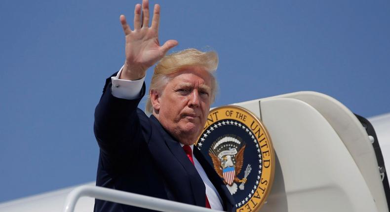 U.S. President Donald Trump boards Air Force One for travel to New Jersey from Joint Base Andrews, Maryland, U.S. August 4, 2017.