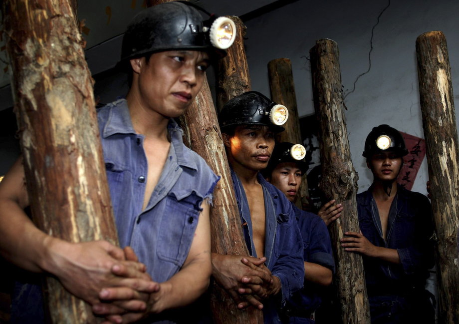 Miners prepare to carry out rescue work at the flooded Nadu mine in Tiandong county, Guangxi Zhuang autonomous region, July 23, 2008.