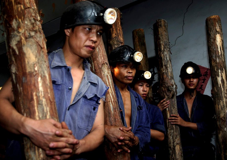 Miners prepare to carry out rescue work at the flooded Nadu mine in Tiandong county, Guangxi Zhuang autonomous region, July 23, 2008.