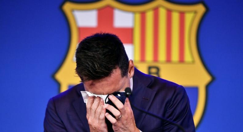 A emotional Messi struggles to compose himself before addressing reporters on his departure from Barcelona after 17 years playing for his only club