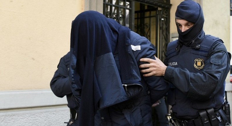 Illustrative photo. Two men arrested in Spain during a joint investigation between Spanish and Belgian police in 2016 (AFP)