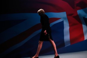 Britain's Home Secretary Theresa May leaves the stage after speaking on the third day of the Conserv