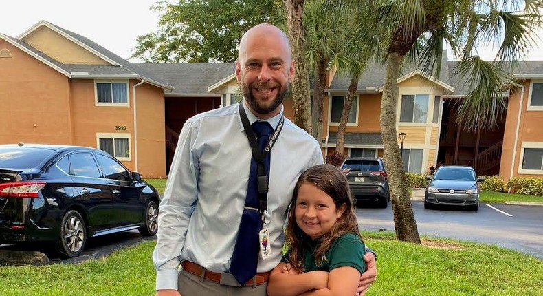 Matthew Tomko, a social studies teacher from Florida, with his daughter.
